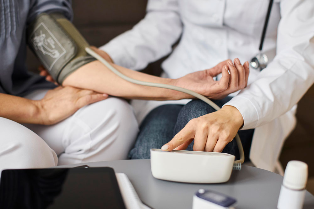 Doctor measuring blood pressure