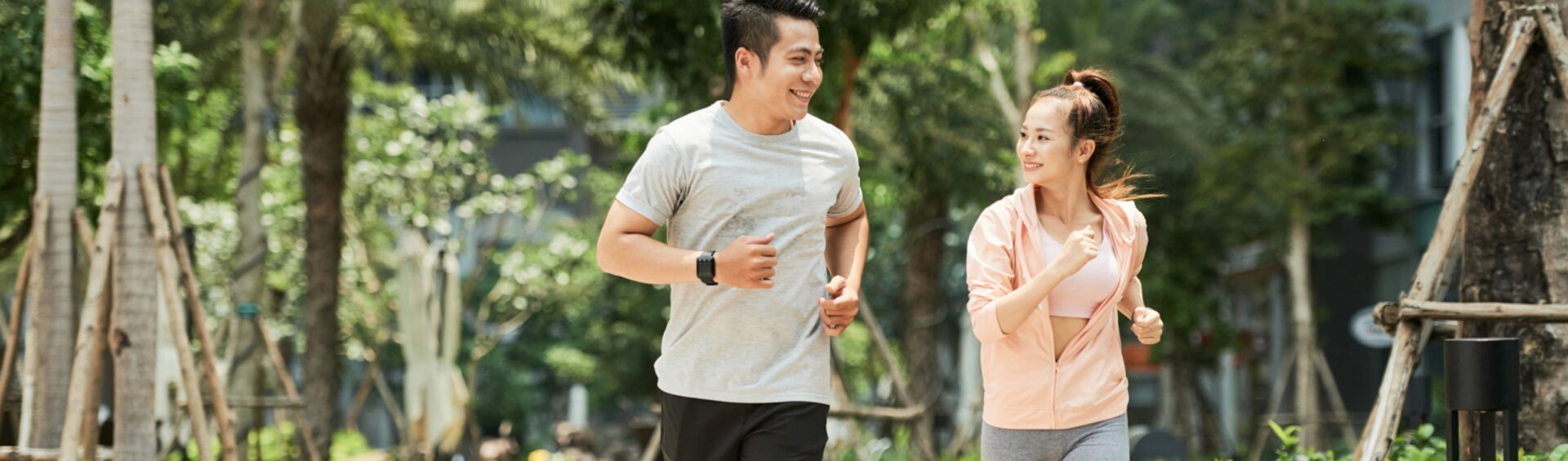 Healthy couple jogging in the park